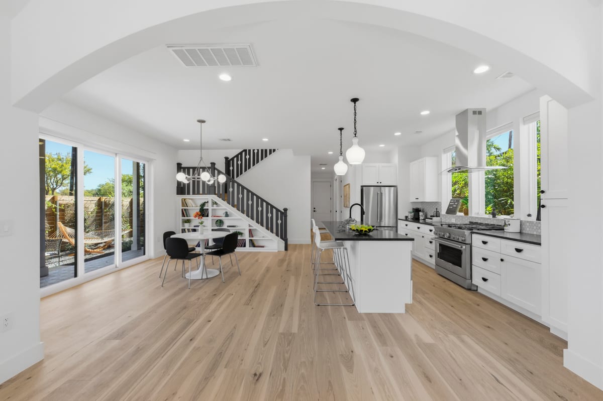 Open kitchen and living area in a KiliGray Homes home